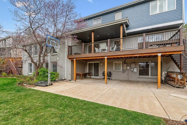 6062 S Emporia Cir, Englewood, CO 80111 - rear view of house featuring a deck, stairs, brick siding, a patio area, and a yard