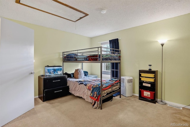 8108 S Fillmore Cir, Centennial, CO 80122 - bedroom with attic access, light carpet, and a textured ceiling