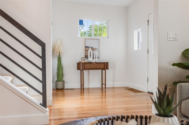 entrance foyer with hardwood / wood-style floors