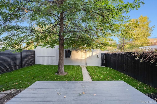 view of yard with a wooden deck