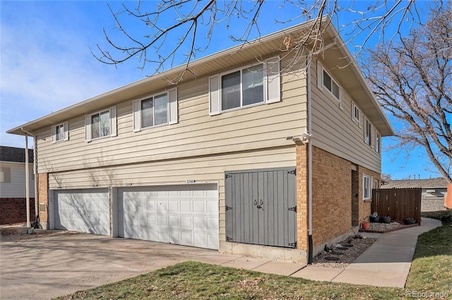 view of property exterior featuring a garage