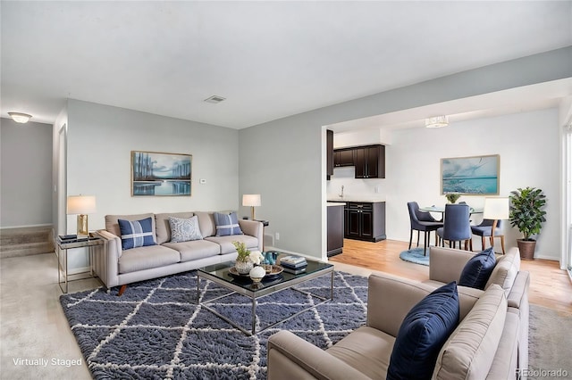 living room featuring light hardwood / wood-style flooring