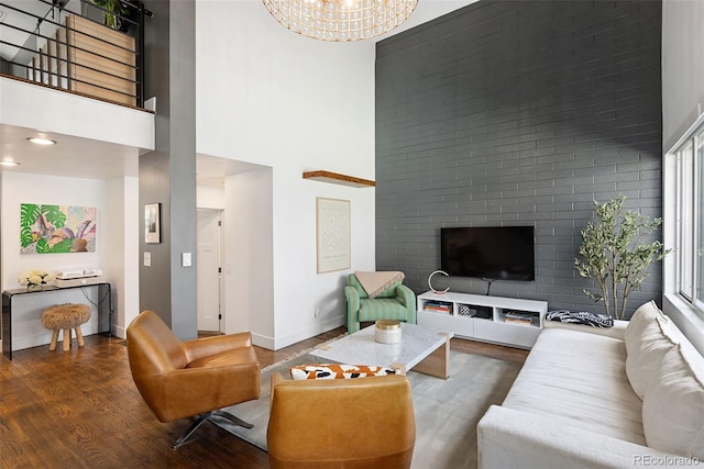 505 Detroit St, Denver, CO 80206 - living room with wood finished floors, a towering ceiling, and a chandelier