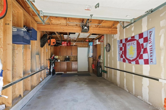 505 Detroit St, Denver, CO 80206 - garage featuring a garage door opener