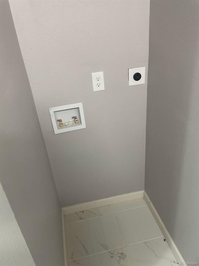 washroom with laundry area, hookup for a washing machine, marble finish floor, baseboards, and hookup for an electric dryer