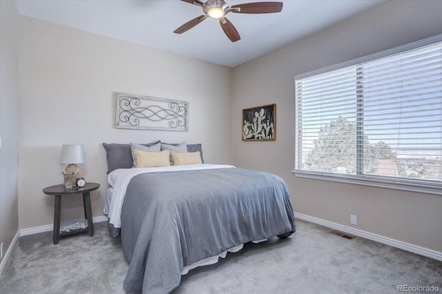 carpeted bedroom featuring ceiling fan