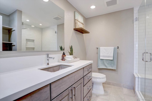 bathroom featuring walk in shower, vanity, and toilet