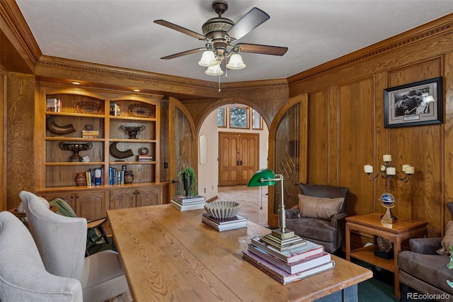 5 Tamarade Dr, Littleton, CO 80127 - office with arched walkways, wooden walls, and a ceiling fan