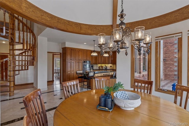 5 Tamarade Dr, Littleton, CO 80127 - dining space with an inviting chandelier, light tile patterned flooring, stairs, baseboards, and beam ceiling