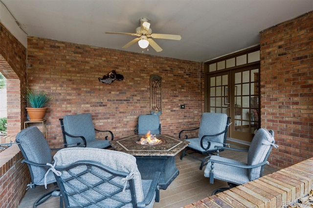 5 Tamarade Dr, Littleton, CO 80127 - deck featuring french doors, ceiling fan, and a fire pit