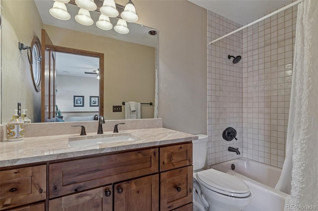 5 Tamarade Dr, Littleton, CO 80127 - full bathroom featuring a textured wall, shower / bathtub combination with curtain, vanity, and toilet