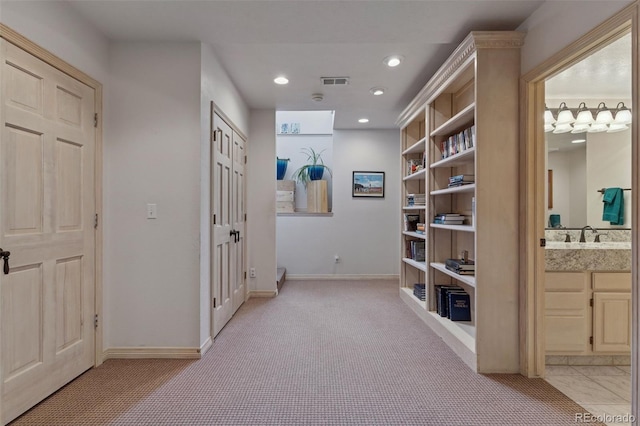 5 Tamarade Dr, Littleton, CO 80127 - hallway featuring visible vents, baseboards, recessed lighting, and light carpet