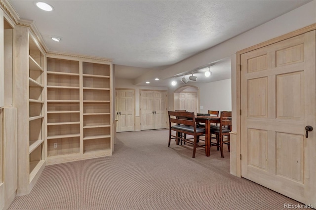 5 Tamarade Dr, Littleton, CO 80127 - dining area with track lighting, recessed lighting, a textured ceiling, arched walkways, and carpet
