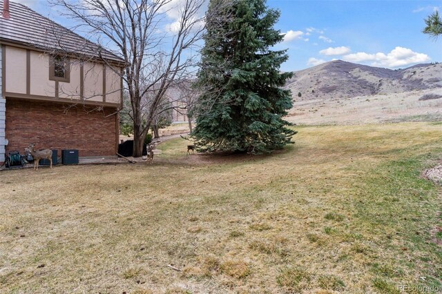5 Tamarade Dr, Littleton, CO 80127 - view of yard featuring a mountain view