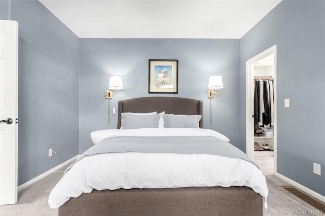4712 Raven Run, Broomfield, CO 80023 - carpeted bedroom with visible vents, baseboards, a spacious closet, and a closet
