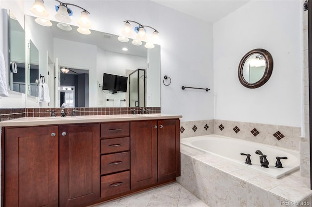4712 Raven Run, Broomfield, CO 80023 - bathroom with a bath, visible vents, a sink, and double vanity