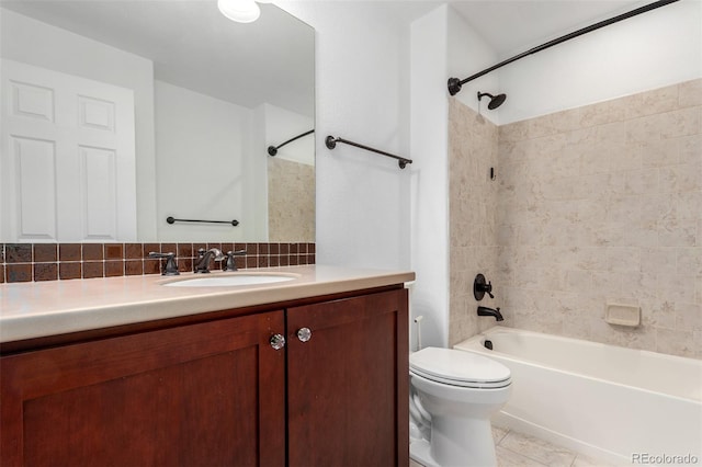 4712 Raven Run, Broomfield, CO 80023 - bathroom featuring  shower combination, tasteful backsplash, toilet, tile patterned flooring, and vanity