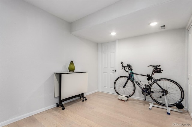 4712 Raven Run, Broomfield, CO 80023 - exercise room with recessed lighting, baseboards, visible vents, and light wood-type flooring