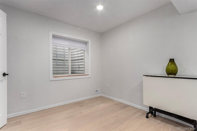 4712 Raven Run, Broomfield, CO 80023 - spare room with baseboards, light wood-style floors, and visible vents