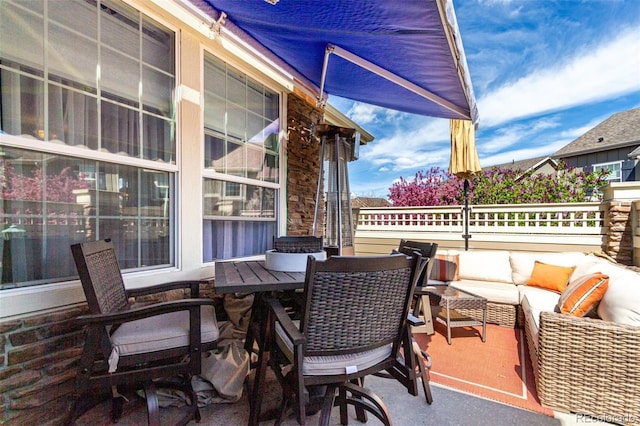 4712 Raven Run, Broomfield, CO 80023 - view of patio with outdoor dining space and an outdoor hangout area