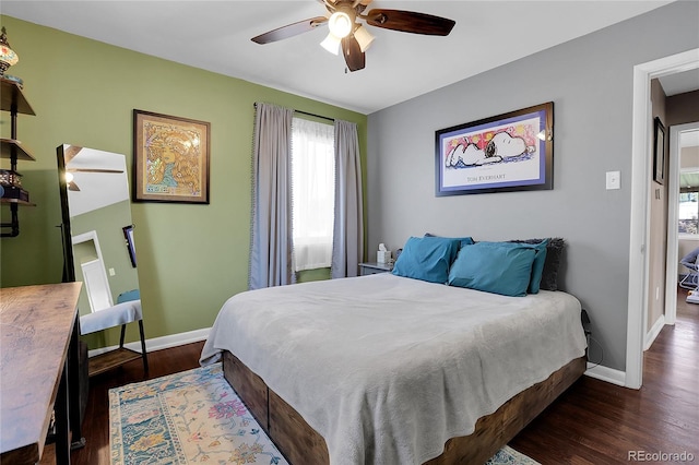 bedroom featuring ceiling fan and dark hardwood / wood-style flooring