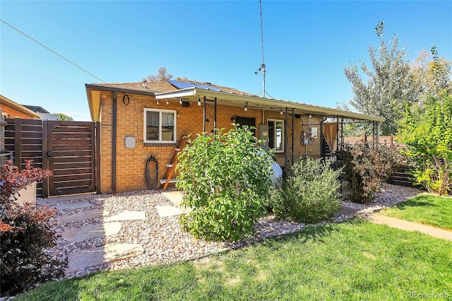 exterior space with a front lawn