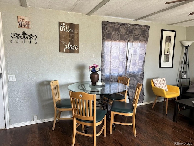 dining room with hardwood / wood-style flooring and ceiling fan