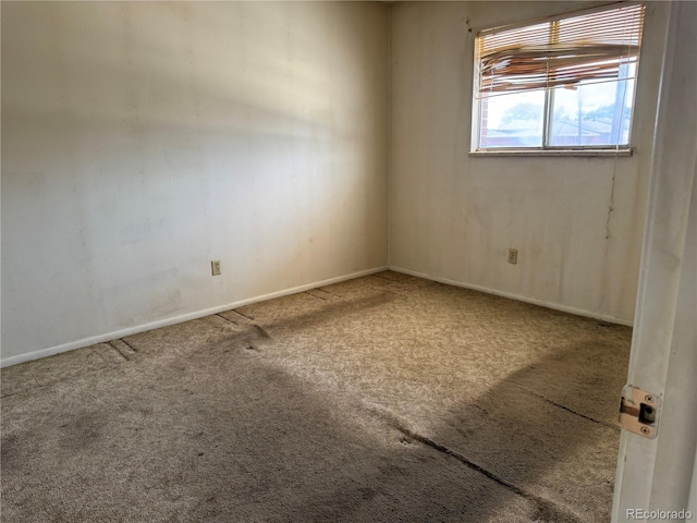 8779 Santa Fe Dr, Thornton, CO 80260 - carpeted spare room featuring baseboards