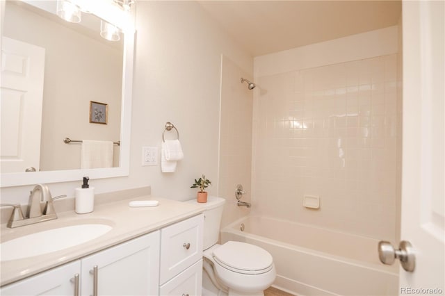 full bath featuring shower / tub combination, vanity, and toilet