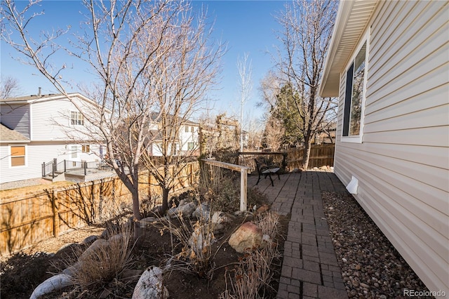 view of yard featuring a fenced backyard