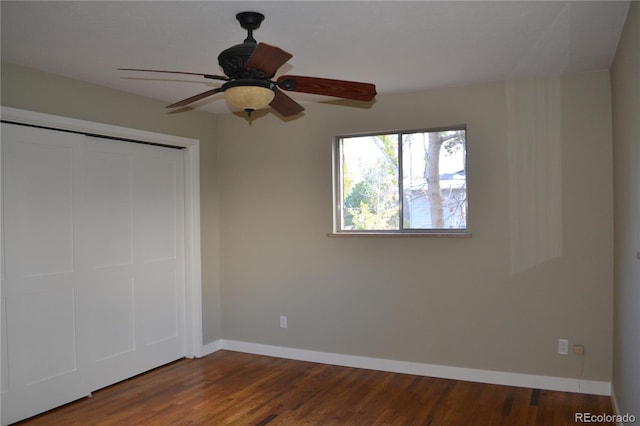 unfurnished bedroom with a closet, ceiling fan, and hardwood / wood-style flooring