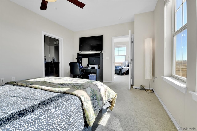 13598 Via Varra Unit 301, Broomfield, CO 80020 - carpeted bedroom featuring a ceiling fan and baseboards