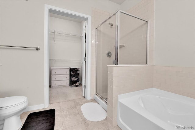 13598 Via Varra Unit 301, Broomfield, CO 80020 - full bathroom with a shower stall, a garden tub, and a walk in closet