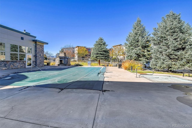 13598 Via Varra Unit 301, Broomfield, CO 80020 - view of swimming pool featuring a patio