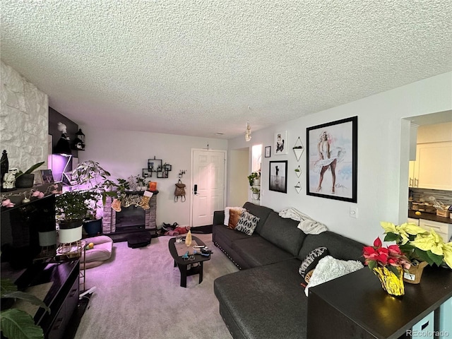 living room with light colored carpet and a textured ceiling