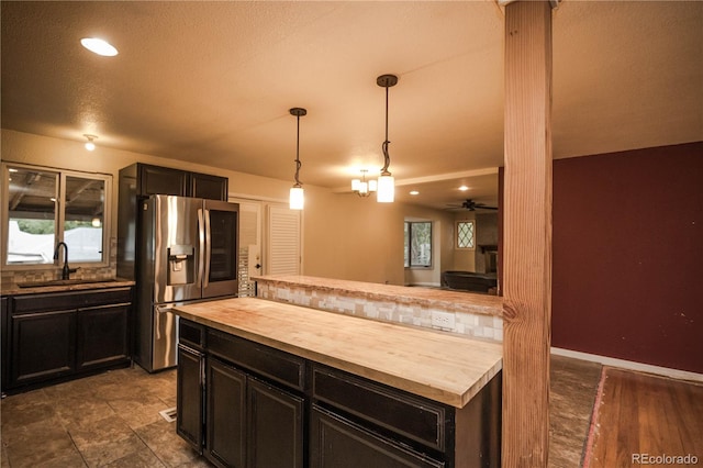 200 Garrison St, Lakewood, CO 80226 - kitchen featuring wooden counters, stainless steel fridge, hanging light fixtures, ceiling fan, and recessed lighting