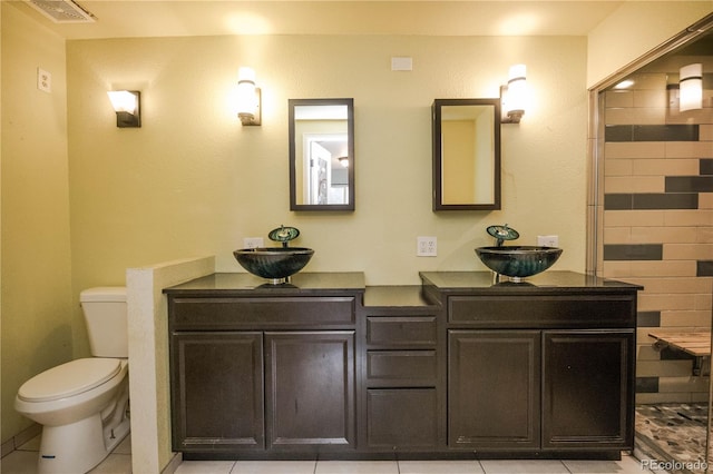 200 Garrison St, Lakewood, CO 80226 - bathroom featuring double vanity and tile patterned floors