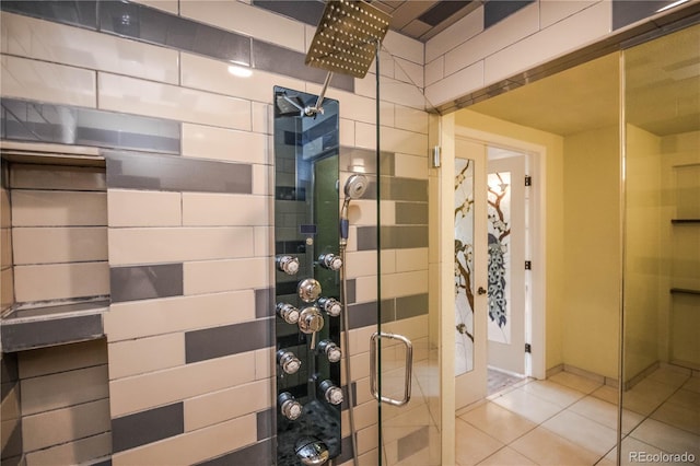 200 Garrison St, Lakewood, CO 80226 - bathroom with a tile shower and tile patterned flooring