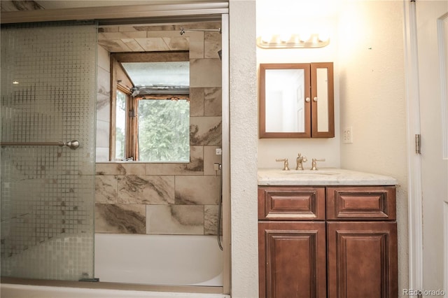 200 Garrison St, Lakewood, CO 80226 - full bath featuring vanity and combined bath / shower with glass door