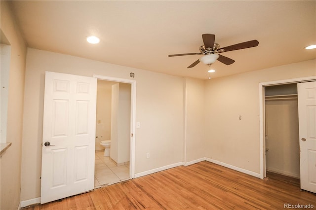 200 Garrison St, Lakewood, CO 80226 - unfurnished bedroom with light wood-style floors, a closet, recessed lighting, and a ceiling fan