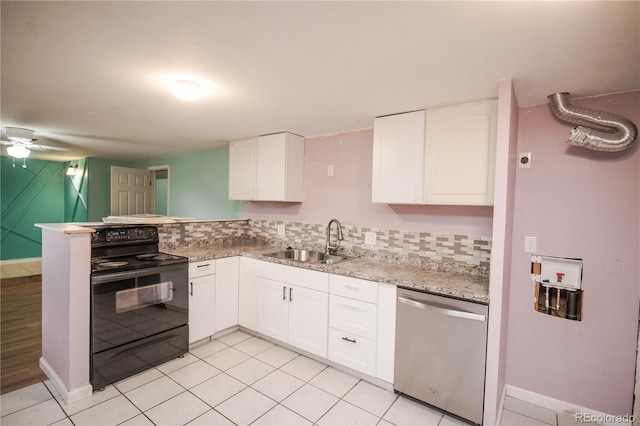 200 Garrison St, Lakewood, CO 80226 - kitchen with black electric range, dishwasher, white cabinets, and a peninsula
