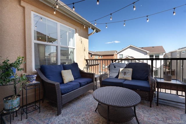 view of patio / terrace with an outdoor hangout area and a residential view