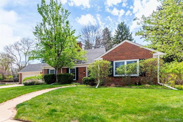 3756 S Forest Way, Denver, CO 80237 - view of front facade with a front lawn, brick siding, driveway, and an attached garage
