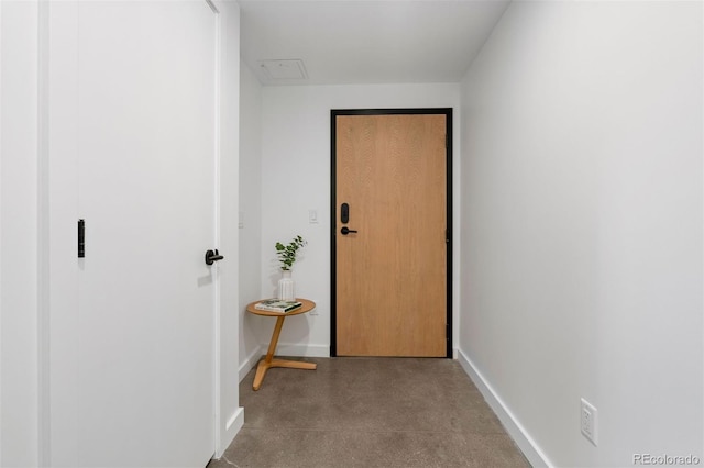 1601 Park Ave Unit 110, Denver, CO 80218 - corridor featuring baseboards and finished concrete floors