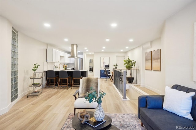 2121 W 33rd Ave, Denver, CO 80211 - living room featuring light wood-style flooring and recessed lighting