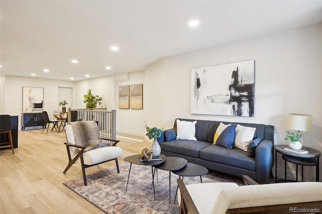 2121 W 33rd Ave, Denver, CO 80211 - living area featuring light wood-style floors and recessed lighting