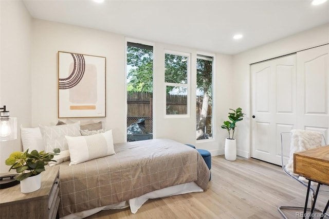 2121 W 33rd Ave, Denver, CO 80211 - bedroom with recessed lighting, light wood-style floors, and a closet