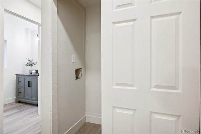 2121 W 33rd Ave, Denver, CO 80211 - corridor featuring light wood-type flooring and baseboards