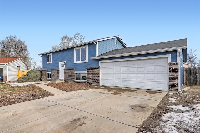 view of front of property with a garage