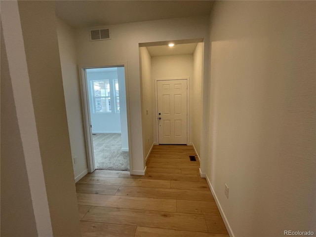 hallway featuring light wood-type flooring